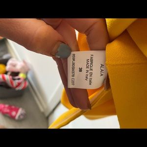 Bright yellow designer dress